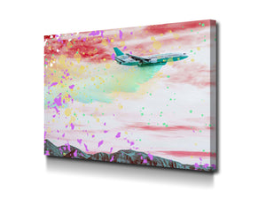 Cuadro Avión sobre cielo de colores en lienzo canvas decorativo